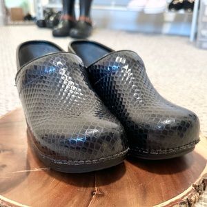Dansko Black Snake Print Mules